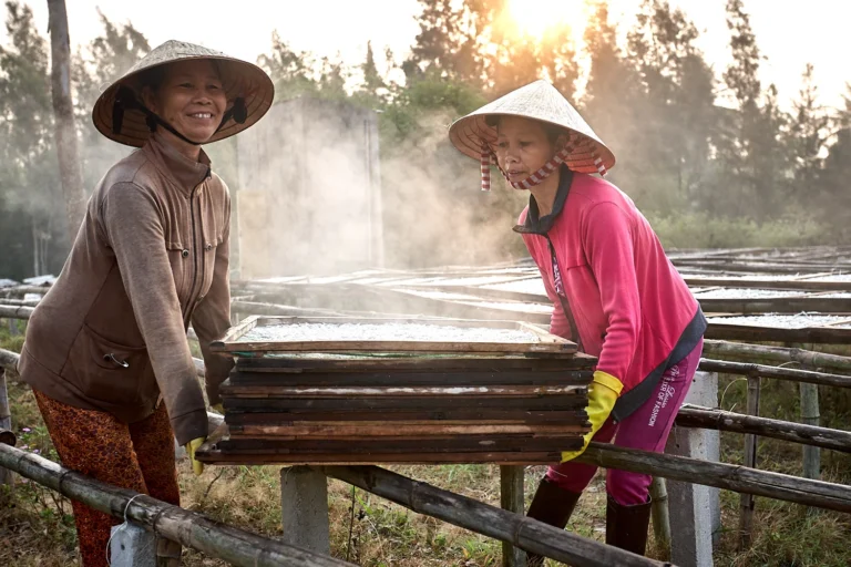 Putting steamed fish outside in a Vietnamese fishing village