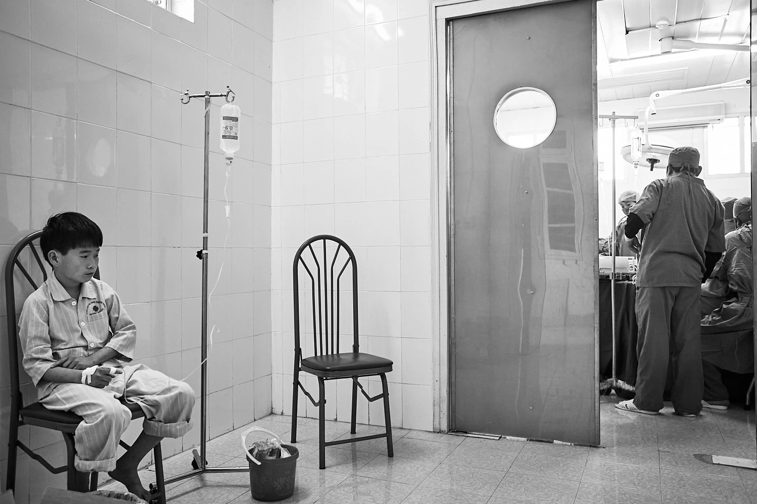 Boy in waiting room in Vietnamese hospital