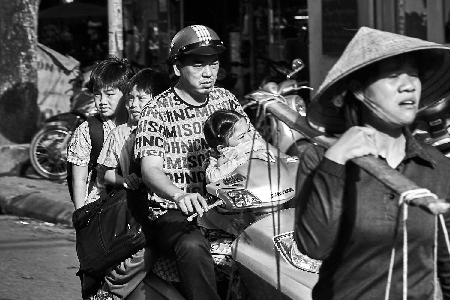 In Vietnam children don´t wear helmets