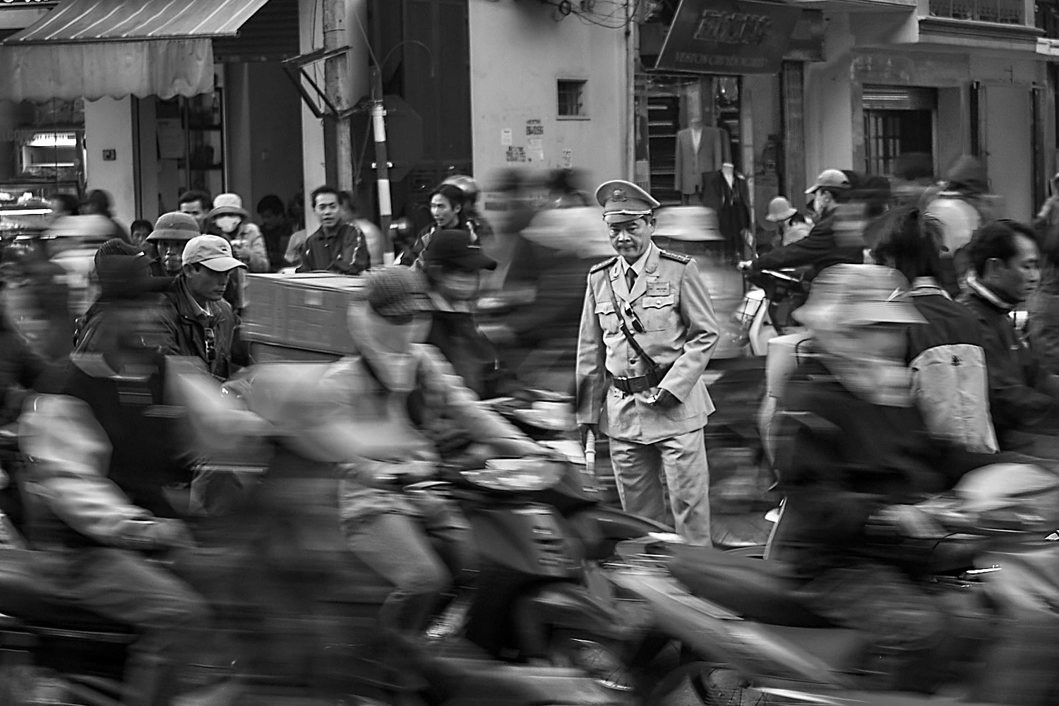 Street cop looking desperate in Hanoi
