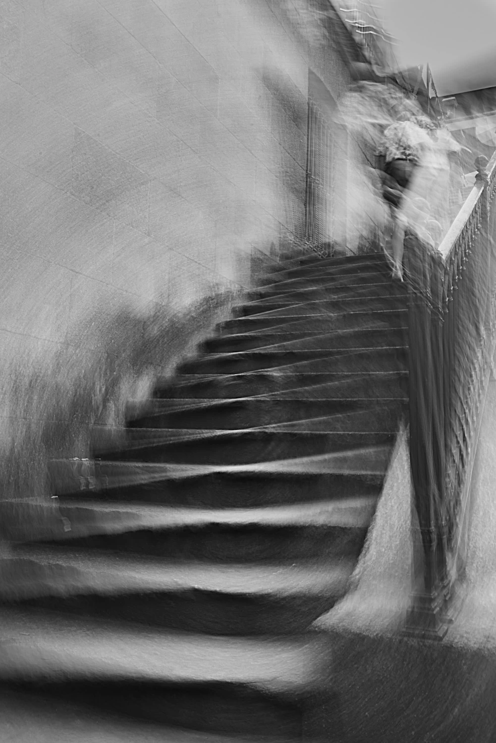 Distorted figure walking up the stairs in Porto
