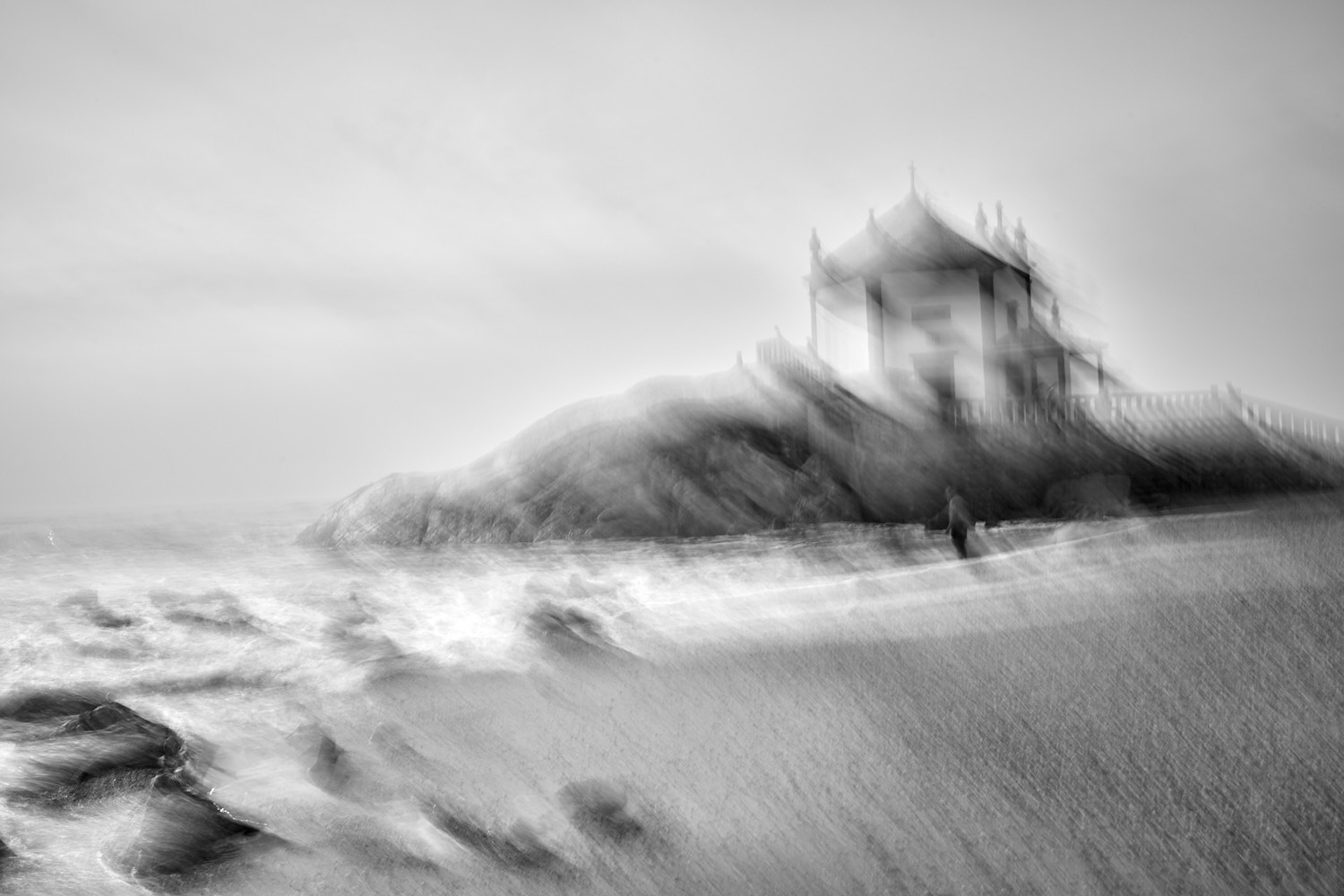 Capela Do Senhor Da Pedra blurry, with one single person