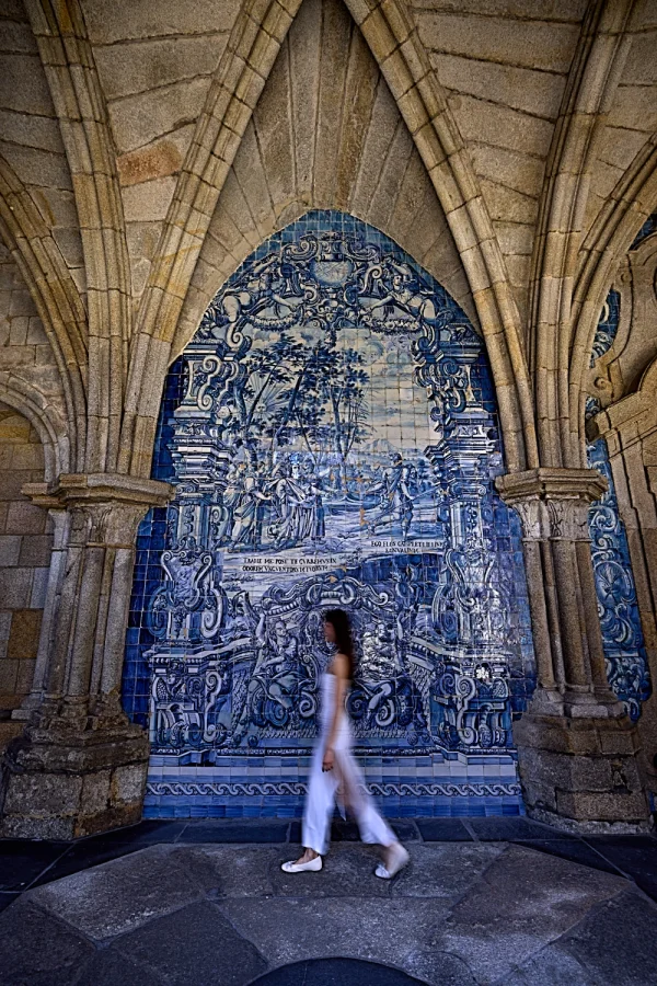 Blurry woman walking in Porto Cathedral